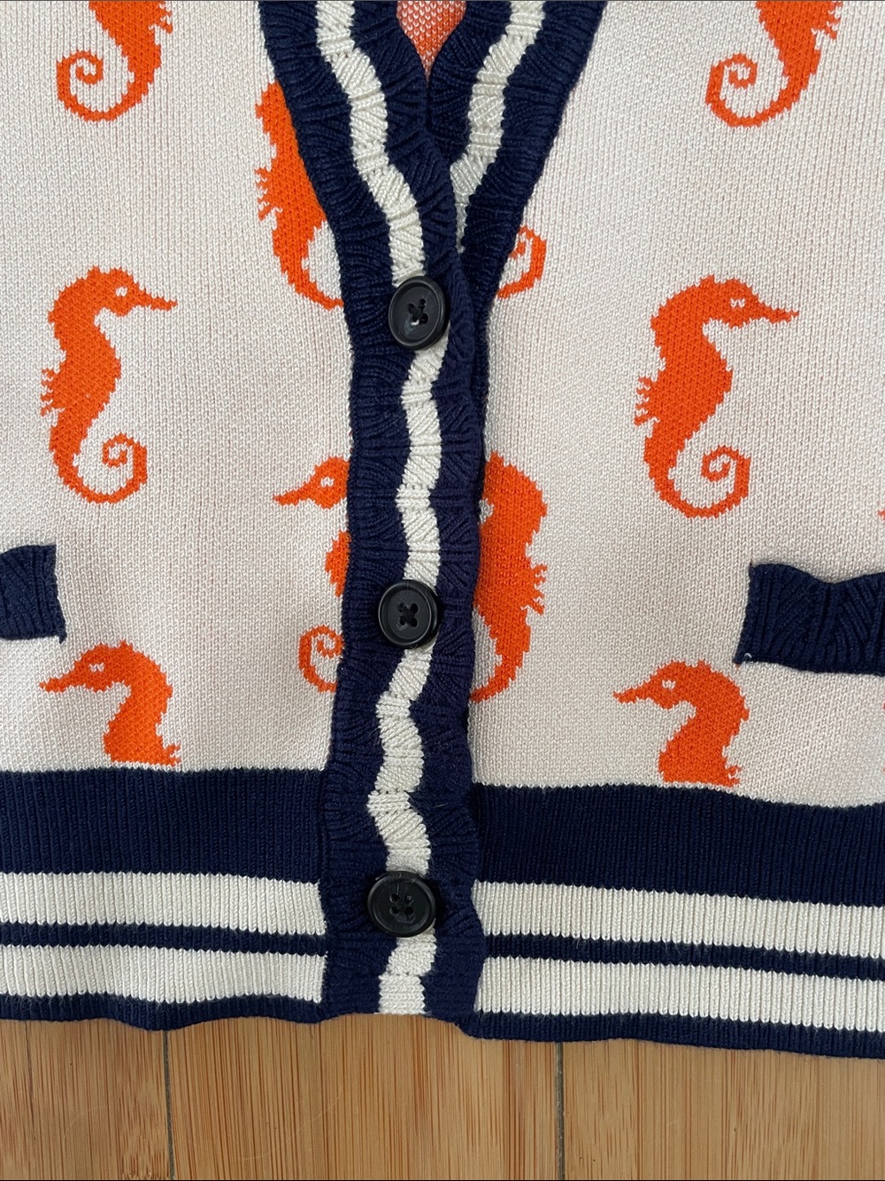 Maeve Orange Seahorse Short Sleeve Cardigan with Navy Trim - Picture 3 of 5